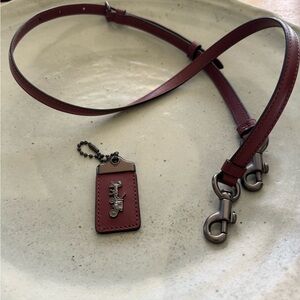 Coach strap and hang tag